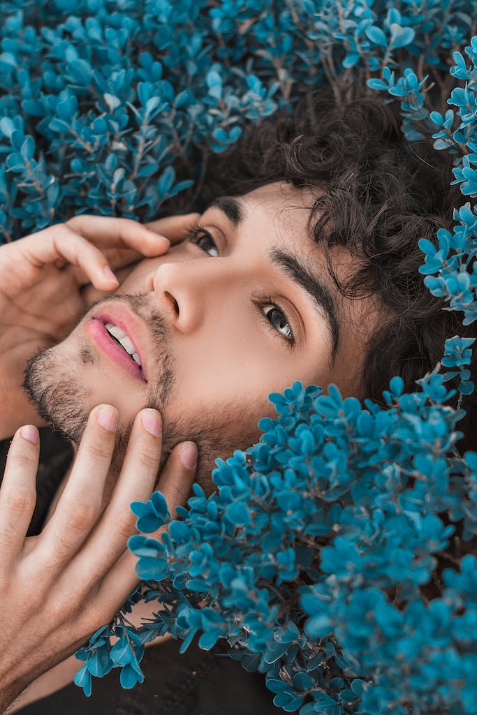Man lies on plants